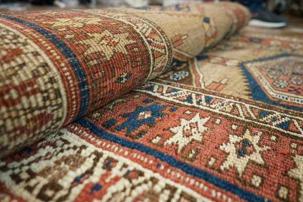 Où apprendre à fabriquer des tapis traditionnels en Iran?